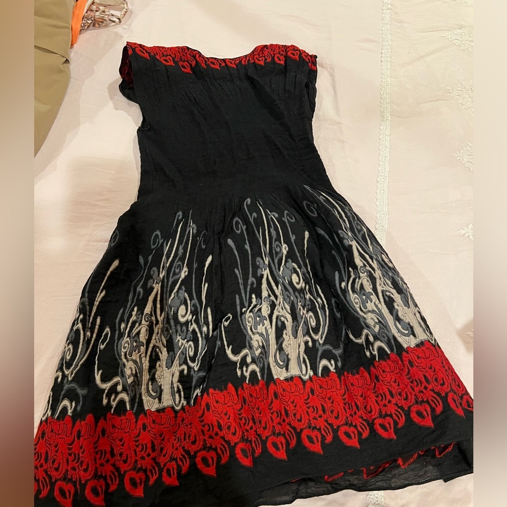 Artsy dress. Worn twice. Makes a statement.
